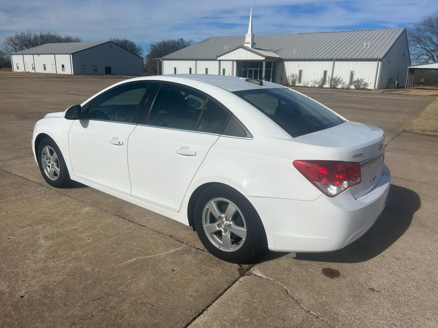 2015 White /Gray Chevrolet Cruze LT (1G1PC5SB6F7) with an 1.4L engine, AUTOMATIC transmission, located at 17760 Hwy 62, Morris, OK, 74445, (918) 733-4887, 35.609104, -95.877060 - Photo#6